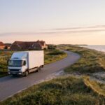 Moving van on the coastal road during a move to Denmark